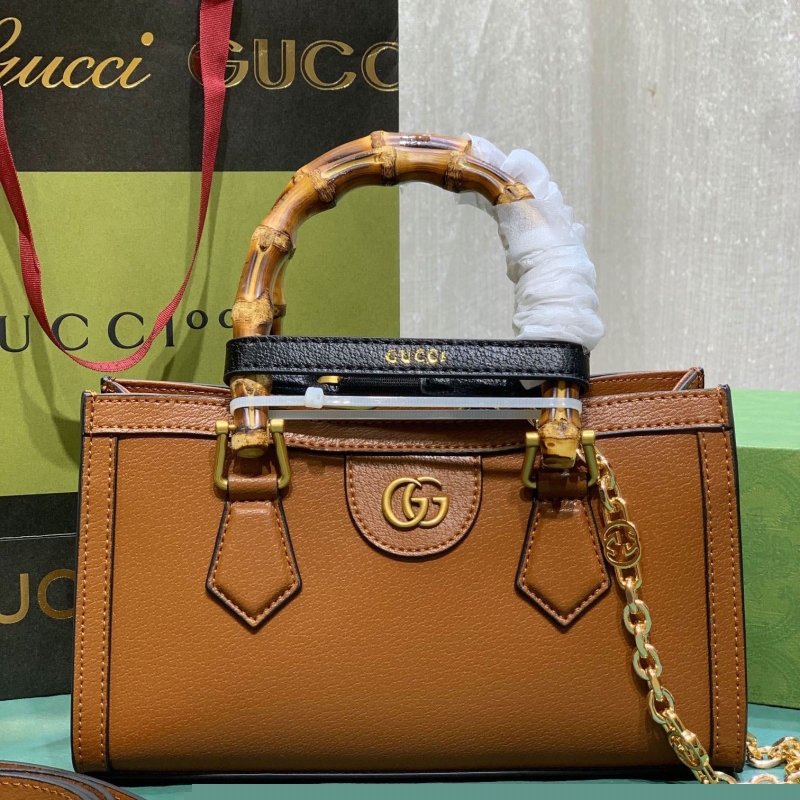G*u*i top handle bags